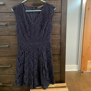 Good condition back zip blue dress with a floral lace overlay.